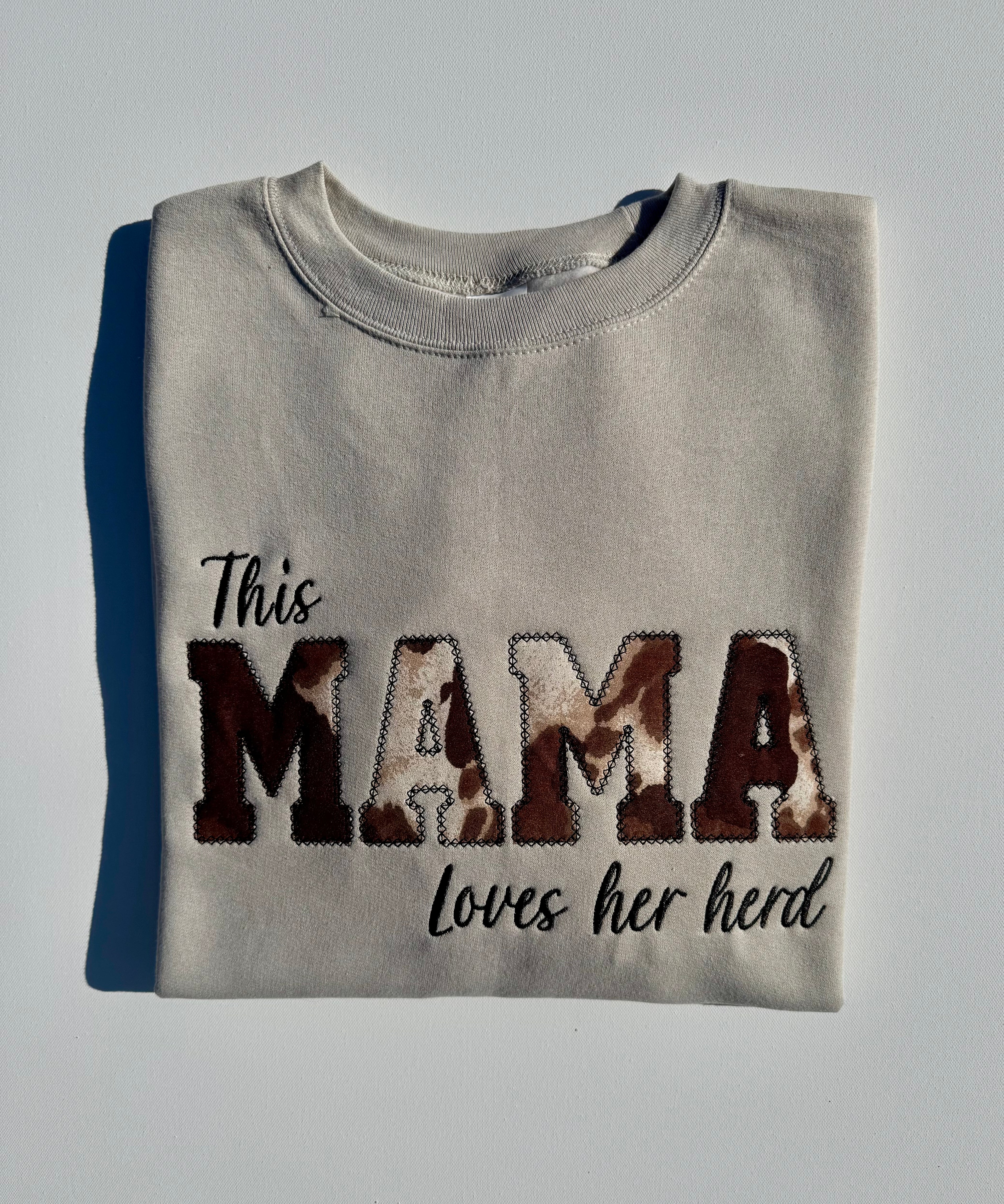 This MAMA Loves Her Herd | Cow Print Applique Crewneck